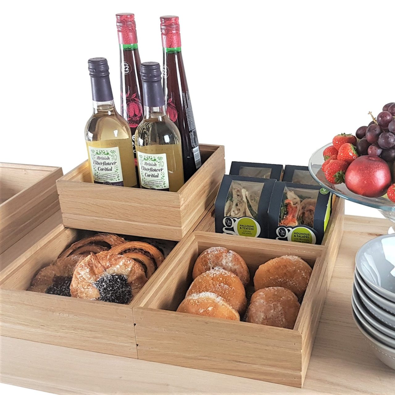 B1-6 Ribbed Natural Oak Trolley Stacker box filled doughnuts and pastries