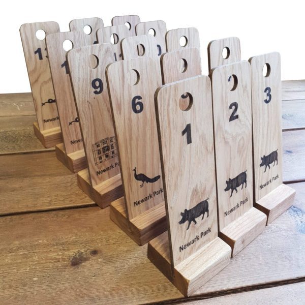 15 Newark Park oak table number displays on table 15 Newark Park oak table number displays on table