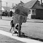 Boys on a racing trolley